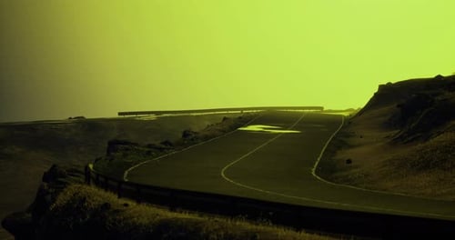 Curved Road Leads to the Horizon Under an Ethereal Green Sky