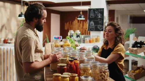 Man Shops for Organic Food at Local Market