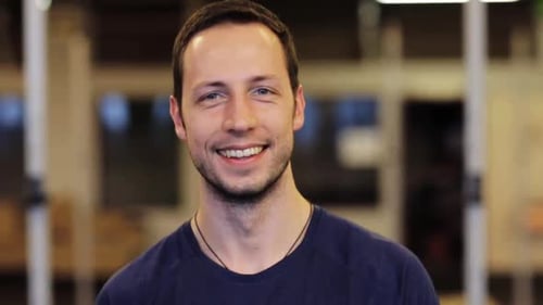 Smiling Young Man Close Up Portrait Indoors