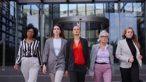 Confident Women Walk Forward in Urban Business Setting