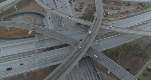 a highway interchange with many cars