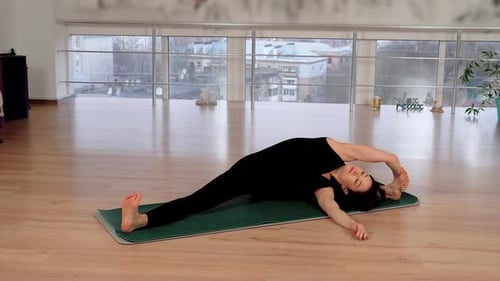 Young Attractive Sporty Woman Practicing Wellness Yoga Indoors Barefoot Female Performing