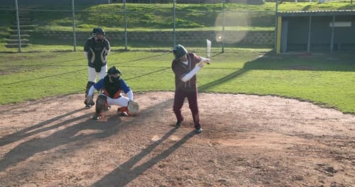 Baseball Players on Baseball Field at Daytime