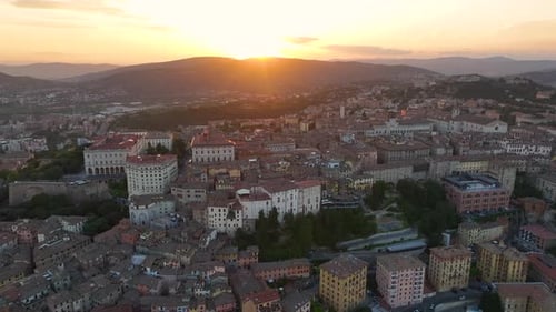 Aerial View of Perugia City Skyline at Sunset Golden Hour Umbria Italy