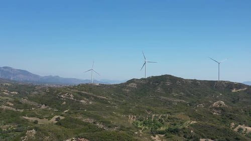 Wind Turbines on a Green Hillside, Aerial View