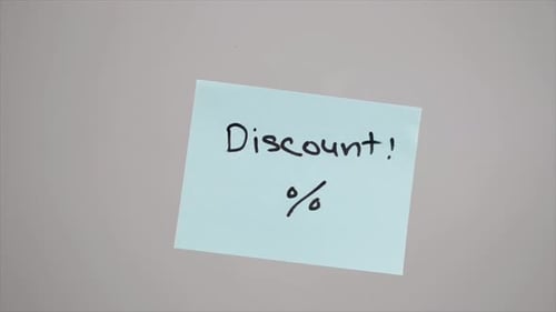 Discount Message on Blue Paper Note