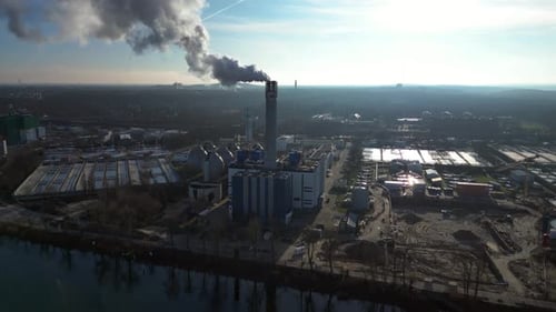Waste energy plant factory with smoke chimney. Marvelous aerial view flight drone
