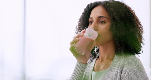 Woman drinking healthy smoothie milkshake for energy, nutrition and fresh wellness in detox