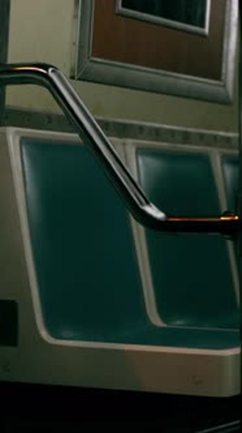 Green Subway Car With Metal Handrail