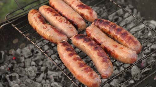 Grilled Sausages Cook Man Preparing Grilling Food Bbq Barbecue with Smoke Flame Outdoors Tasty Juicy