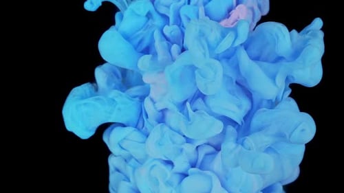 Blue Pink Glitter Ink Spreading in Water Abstract Background