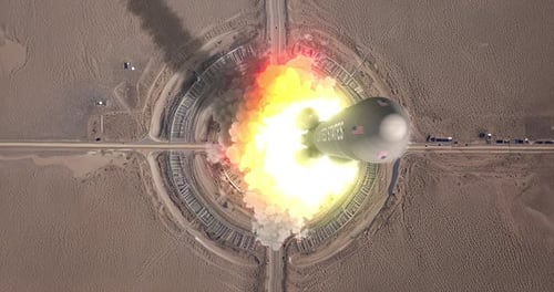 Powerful Rocket Launch from Desert Facility Aerial View
