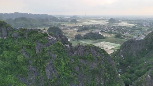 Aerial Drone Footage of Hang Mua Pagoda and Dragon Statue in Ninh Binh Vietnam