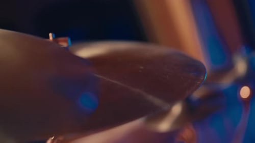 Closeup View of Cymbals of Drum Kit in Musical Studio Drummer Beating Rhythm Drumsticks in Hands of