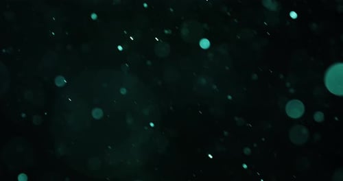Dynamic Cyan Bokeh Particles Flowing