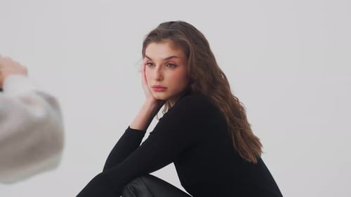 Elegant Woman Posing for Fashion Photoshoot in Studio