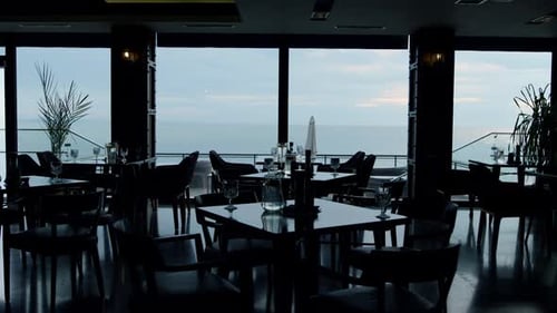 Stunning Panoramic Sea View In Modern Restaurant. Stylish Interior Design In Luxury Lounge Bar Ba...