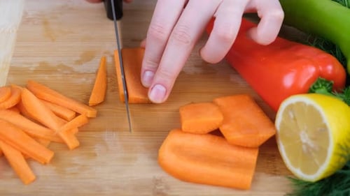 cutting carrot kitchen