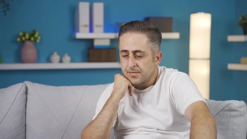 The grieving man is thinking and suffering from depression.