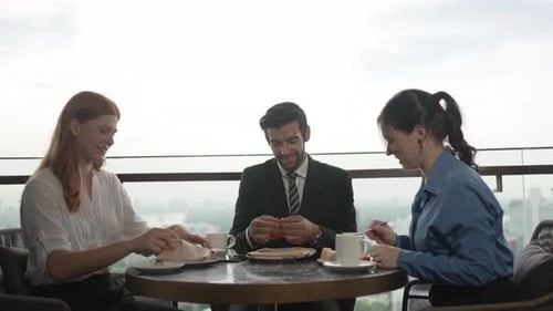 White collar worker meeting at high rise tower.