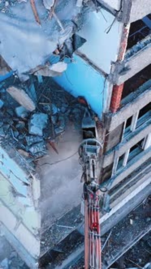 The removal of house wrecks after an earthquake. Dismantling of collapsed structures.
