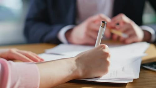 Business People Shaking Hands Concluding Deal in Corporate Office Closeup