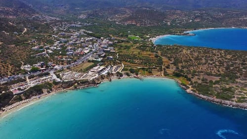 Aerial View of Voulisma Beach with Turquoise Waters and Boat Wake