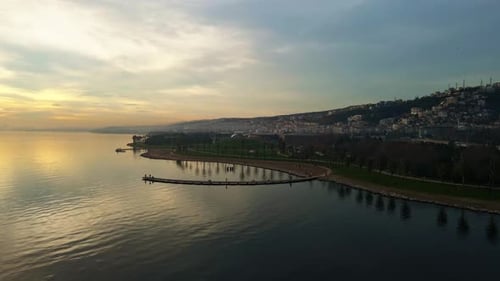 Aerial view of the sea at sunset time in the city