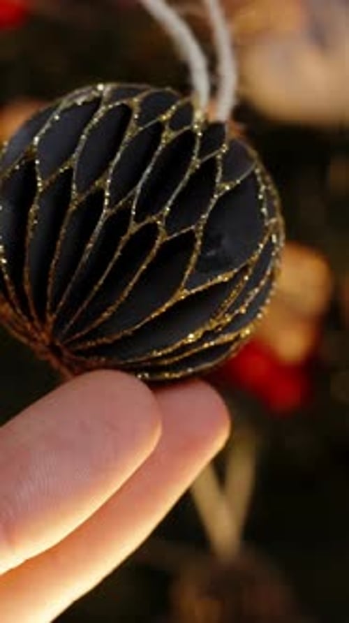 Hand Holds and Spins Christmas Ornament Decoration