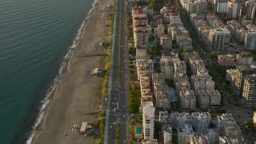 Aerial View Vintage Villas on the Beachfront are Surrounded By a Sparkling Pool and Lush Green Palms