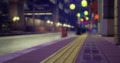 Vibrant City Streets Illuminated at Night Create a Lively Urban Atmosphere