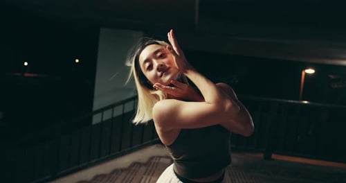 Asian woman, night and ballet dancer with street performance for kpop, choreography