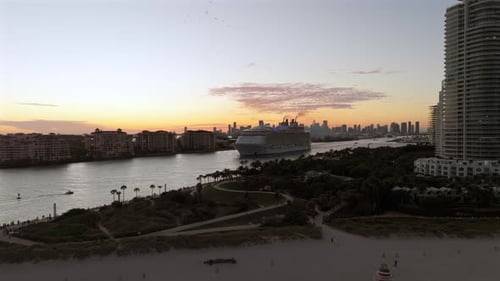 USA Travel Destination Miami Skyline with Ocean Cruise Liner Departing From Port