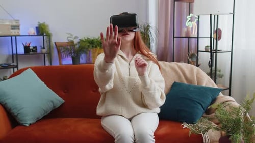 Woman Experiencing Virtual Reality at Home