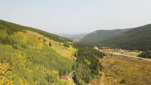 Colorado USA Landscape on Sunny Autumn Day. Aerial View of Aspen Forest, Green Valley and Countrysi