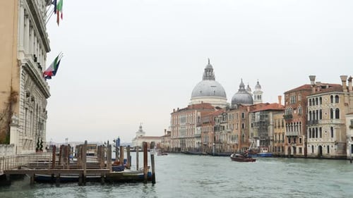 Great Dome Of Santa Maria della Salute With The Grand Canal In Venice, Italy. - wide shot