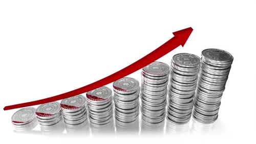 Silver Coins Stacking with Growing Red Arrow