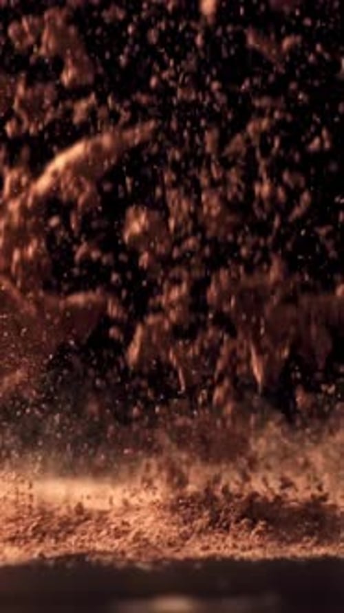 Cocoa Powder Falls on the Table Filmed on a Highspeed Camera at 1000 Fps