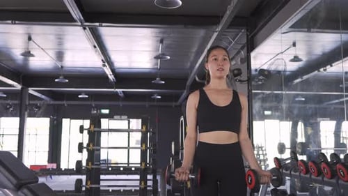 Sporty Asian Woman Exercise Training Building Muscles and Burning Fat Cardio