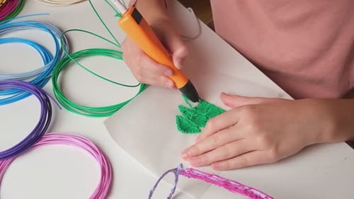 Child Creating 3D Design with a 3D Pen