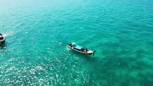 Aerial View of a Picturesque Bay with Boats and a Tropical Seascape