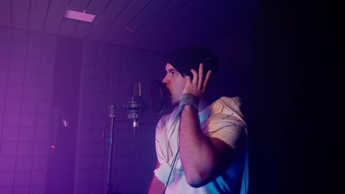 Man Rapper Recording Track in Music Studio
