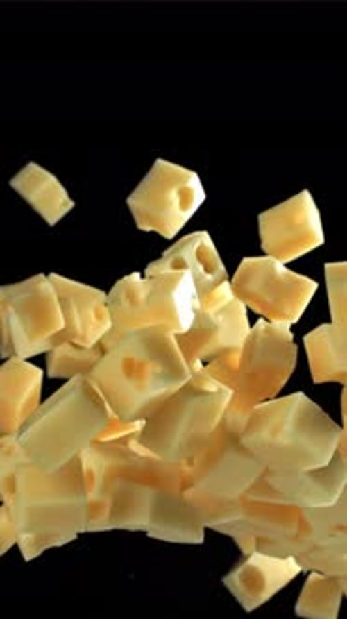 Super Slow Motion Pieces of Cheese on Black Background Filmed on a Highspeed Camera at 1000 Fps