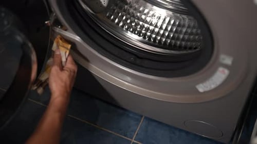Cleaning Washing Machine Appliance with Checkered Towel