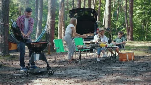 Family Barbecue in the Woods An Exciting and Enjoyable Outdoor Gathering for All