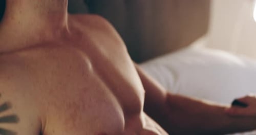 A young couple getting intimate in their home