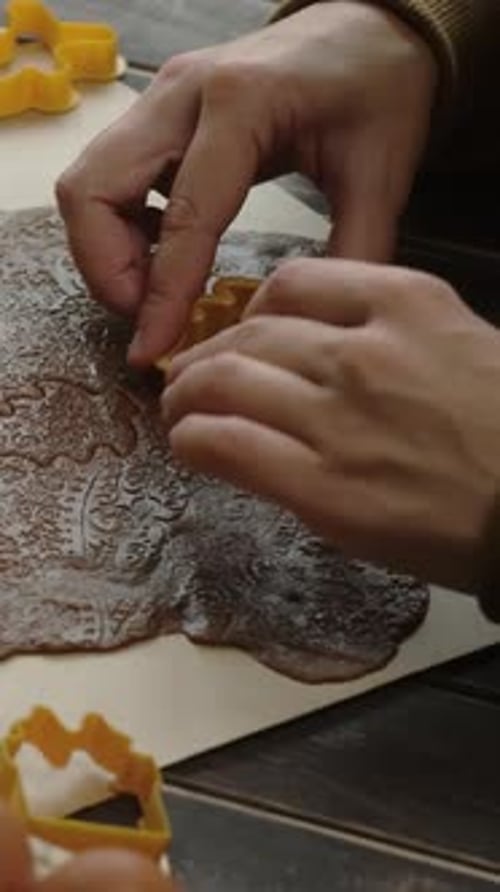 Holiday Cookie Cutting on Intricately Patterned Dough