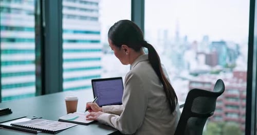 Business, writing and woman at desk, laptop and thinking with economy analyst in modern office