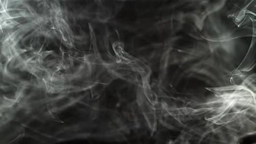Ethereal Swirling Smoke Cloud on Black Background