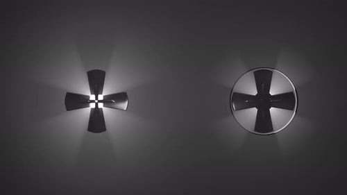 Riesige Lüfter, die sich drehen und Lichtstrahlen durchdringen sie.